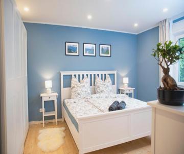 Moderne Wohnung im Grünen mit privatem Garten