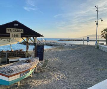 Malaga Beach And Sun