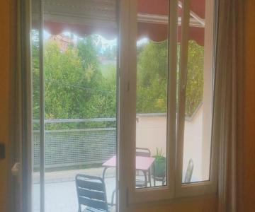 Habitación Triple Con Bañera Y Terraza Hotel Suite Mioño