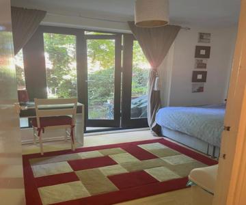 Charming Bedroom with Garden