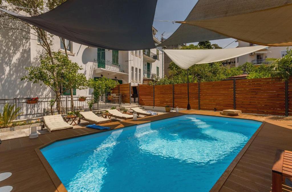Evala luxury rooms with pool and garden