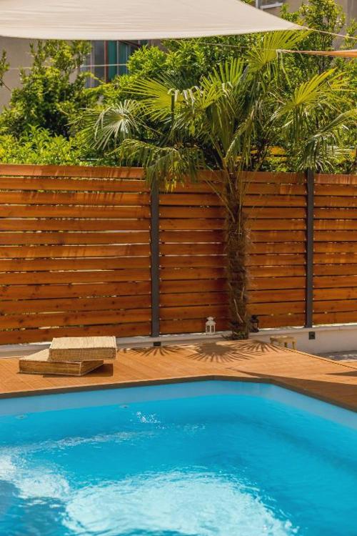 Evala luxury rooms with pool and garden