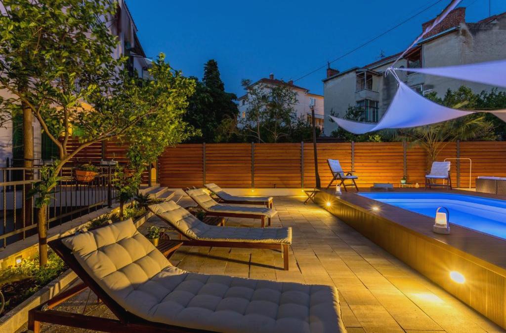 Evala luxury rooms with pool and garden