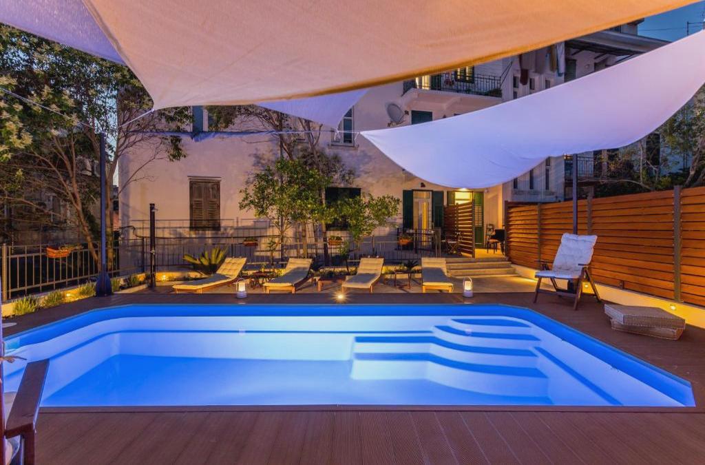 Evala luxury rooms with pool and garden