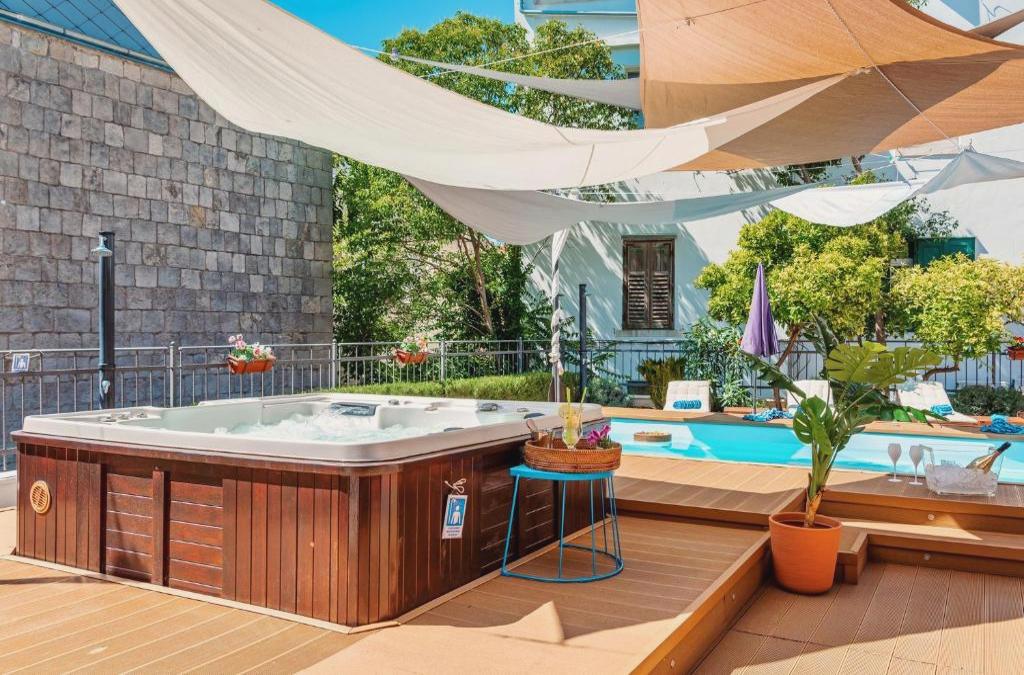 Evala luxury rooms with pool and garden