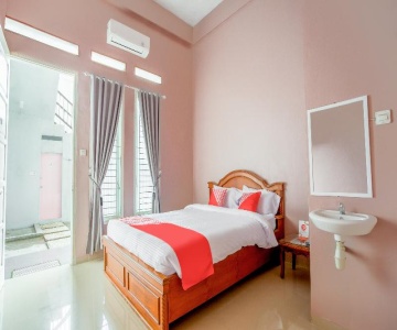 Twin House Syariah by OYO Rooms
