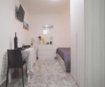 Triumvirato Rooms