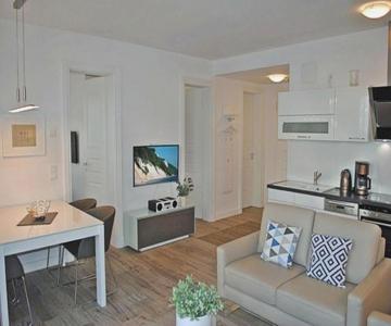 Villa Poseidon - WE 5 mit Strandkorb am Strand und strandnah