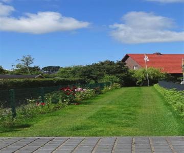 Ferienhaus Eulenhaus im urigen Garten