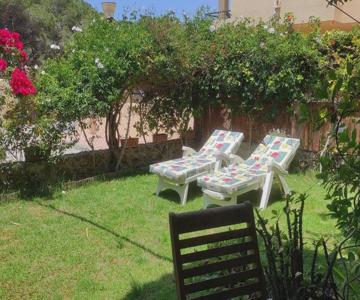 Apartamento a pie de playa con jardin privado