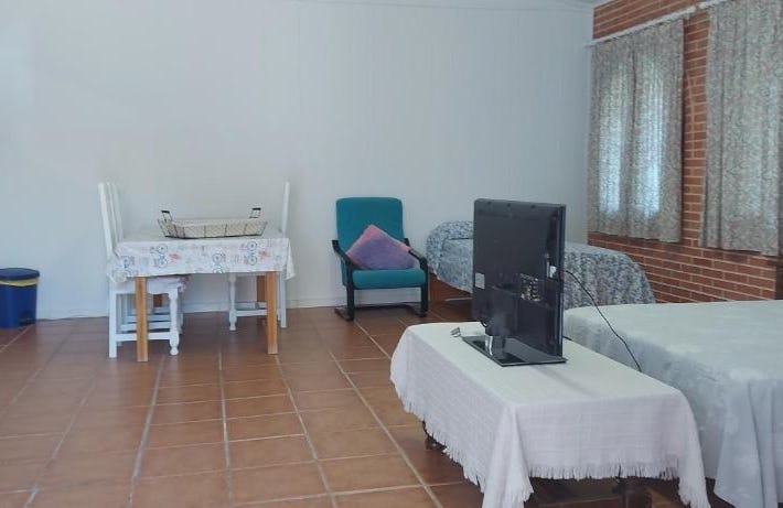 Habitación,Piscina y Jardín