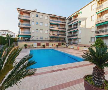 Near beaches large private patio, aircon & community pool