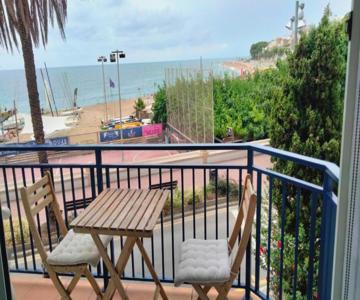 Beachfront Apartment with Sea Views & Private Parking