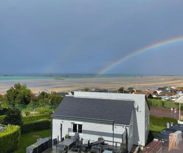 Plage du Débarquement. Maison bord de Mer