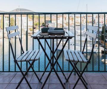 Bright nest with balcony and view on the port