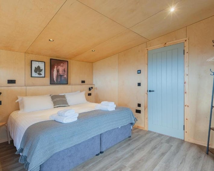 Rustic Cabins, sea views from rewilded farm with Highland Cows