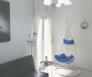 Blue swing chair apartment
