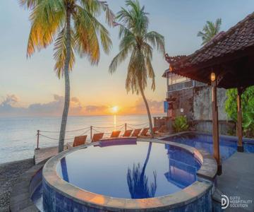 Paradise Palm Beach Bungalows and Dive Center