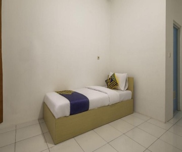 Oryza Place Syariah by OYO Rooms