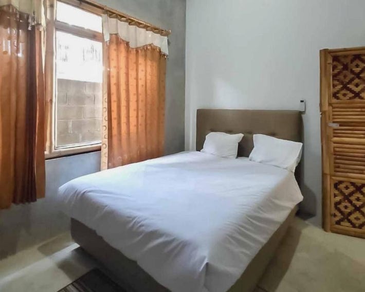 Sukawana Guest House Mitra RedDoorz