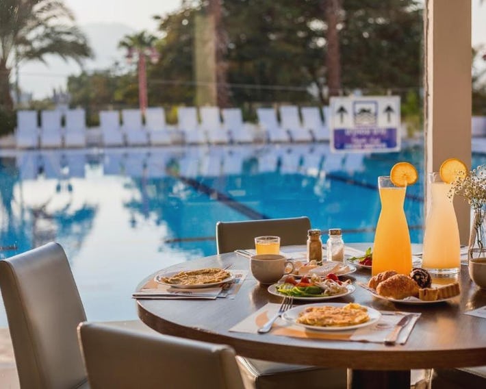 Astral Nirvana Suites- Half Board