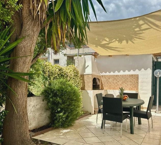 Giardino privato & BBQ Relax a La Caletta per 4