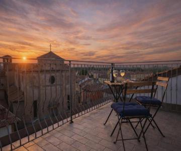 Attico elegante con terrazza panoramica, in centro