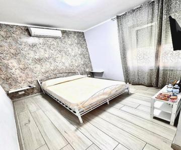 Camera matrimoniale elegante e confortevole con aria condizionata