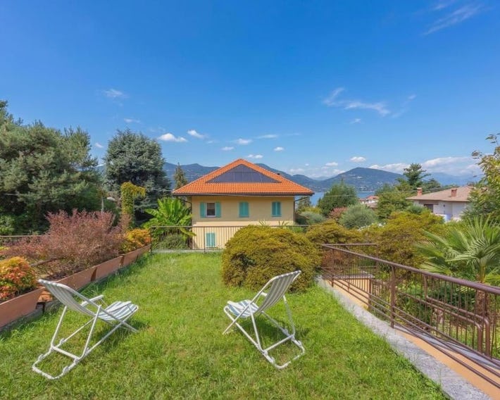 Sunset in Ranco: Lakeview Townhouse with Private Garden - Happy Rentals
