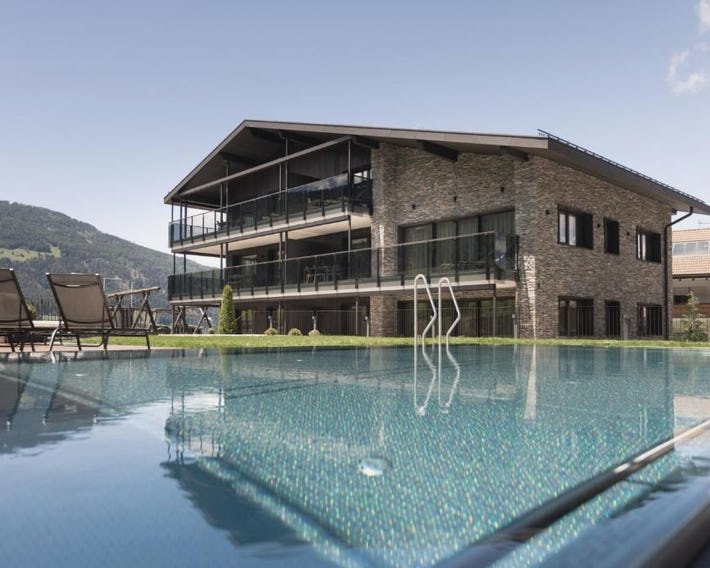 Suitehouse, Premium Apartments, Pools & Spa in Dolomites - by Familiaris