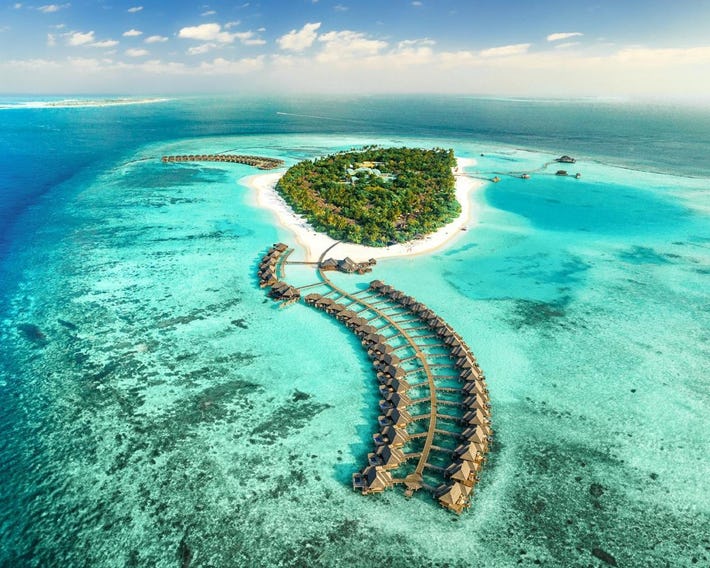 Sun Siyam Iru Fushi with Free Transfer