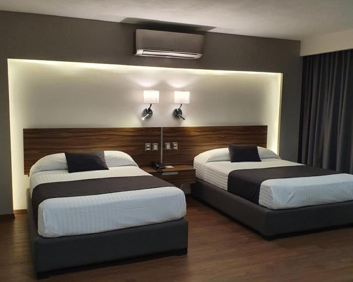 Estanza Hotel & Suites