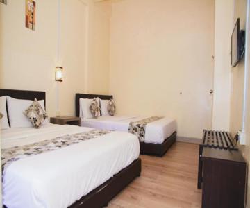 OYO 703 MyRA Hotel