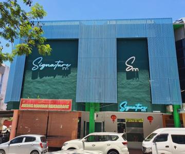 Signature Inn by OYO