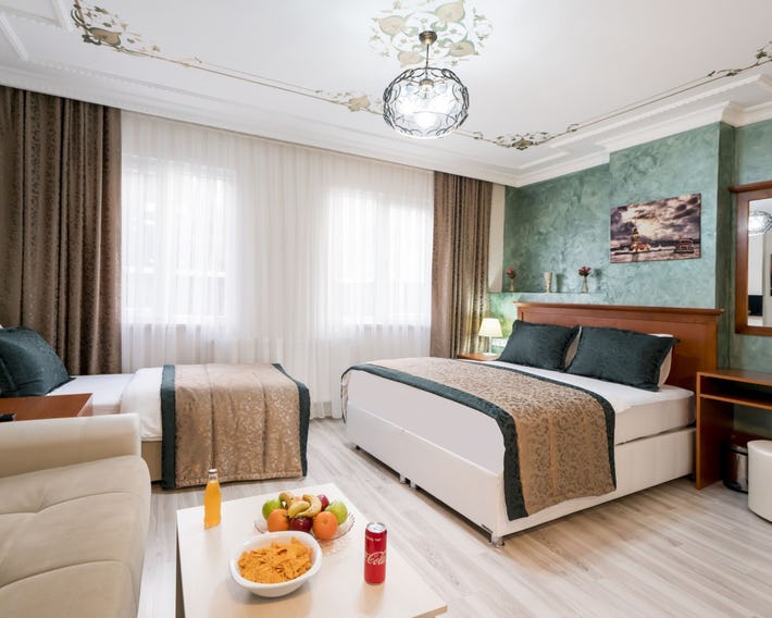Atam Suites & Apart