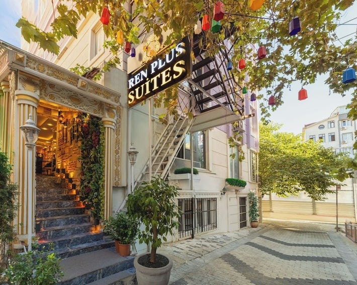 Ren Plus Suites Hotel