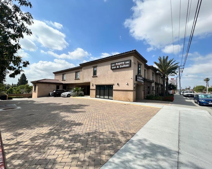 ASPIRE INN & SUITES Orange